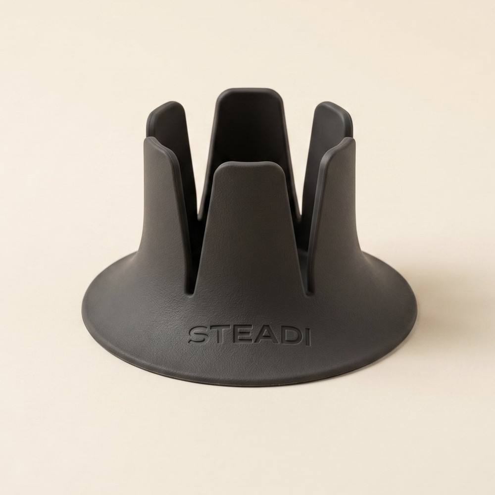 The empty drink base seen from above: six soft fins standing in a ring over a wide, flared foot stamped STEADI.